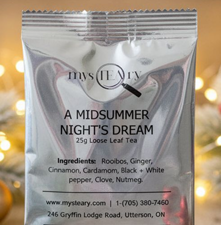 Mysteary tea package with loose leaf tea ingredients on a blurred background