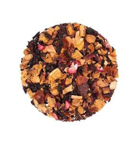 Tea ball with assorted tea leaves on a white background