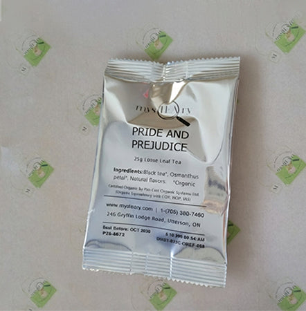 Tea package labeled 'Pride and Prejudice' on a light background with green logos.